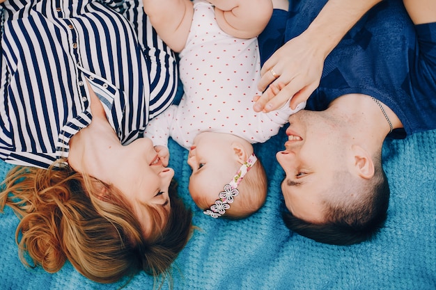 Cute family playing in a summer park