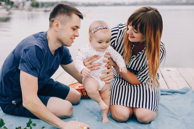 Cute family playing in a summer park