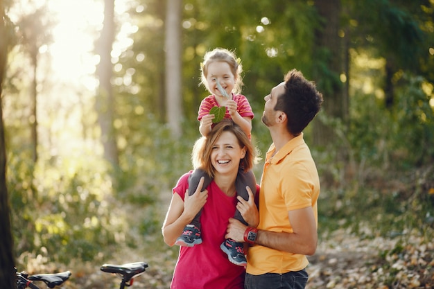 Cute family playing in a summer park