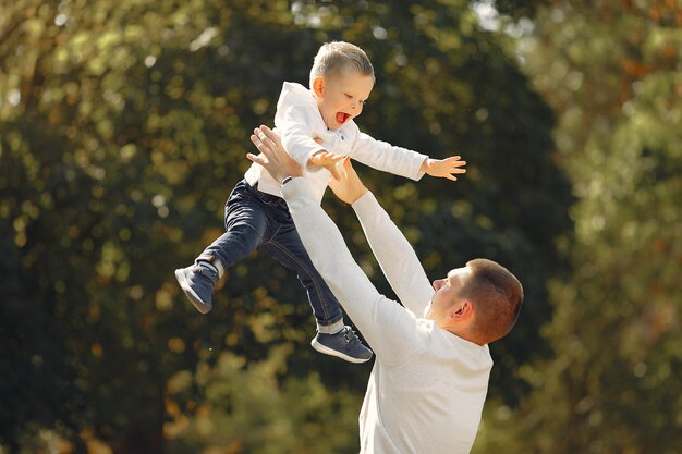 Cute family playing in a summer park