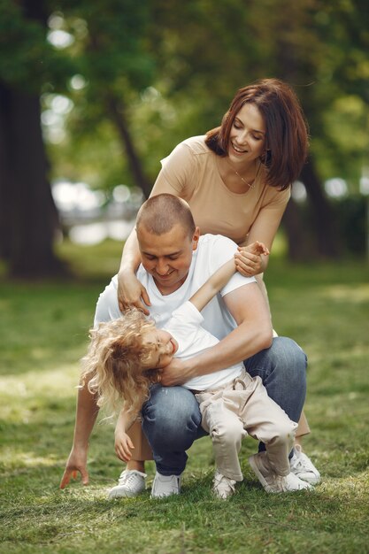 Cute family playing in a summer park