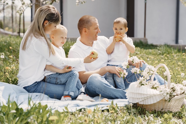 Cute family playing in a summer yard