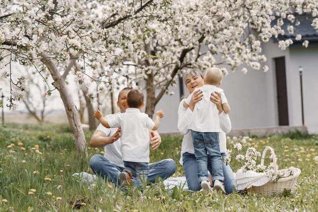 Cute family playing in a summer yard