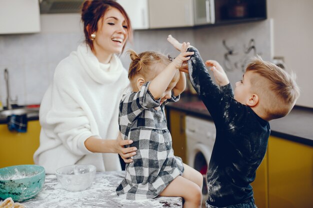 Cute family prepare the breakfest in a kitchen