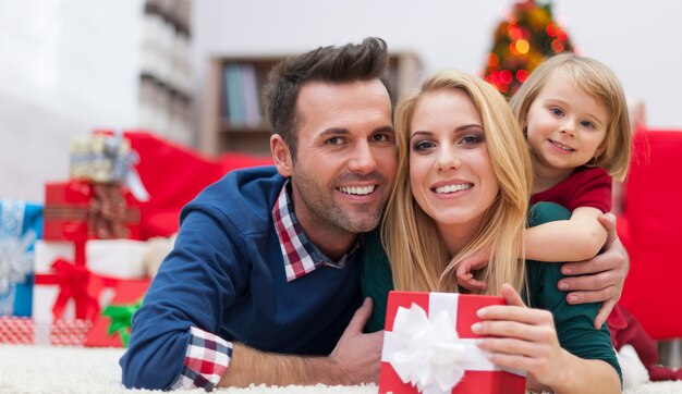 Cute family relaxing in Christmas time