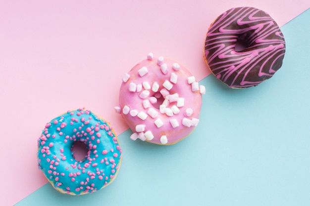 Cute filled donuts in top view