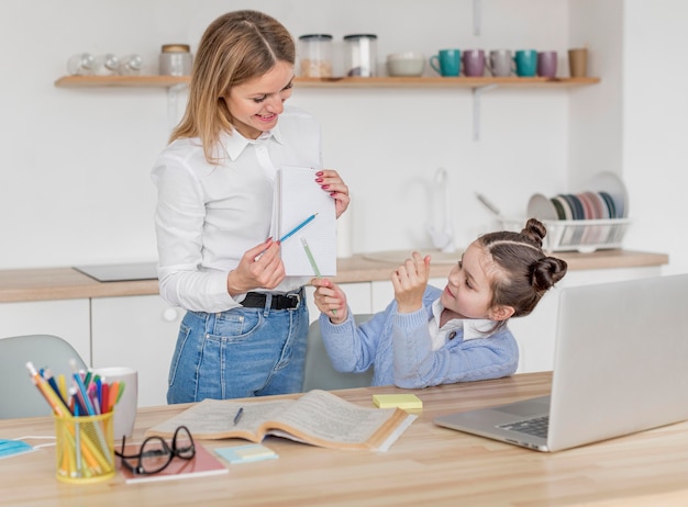 Cute girl being home schooled while on quarantine