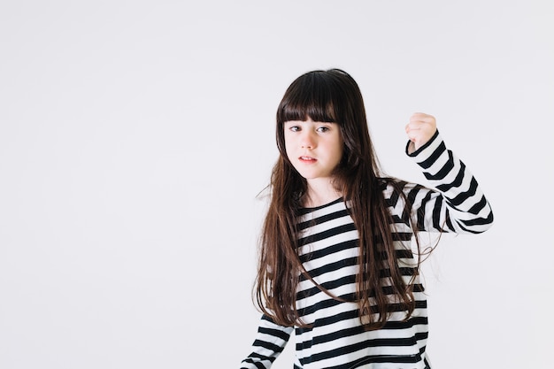 Cute girl gesturing with hand