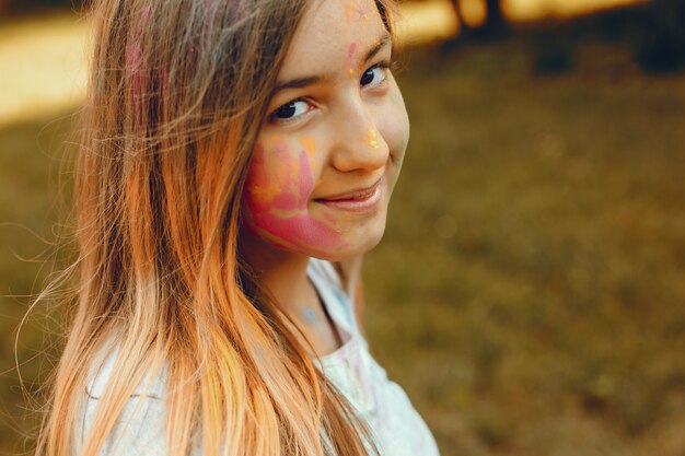 Cute girl have fun in a summer park