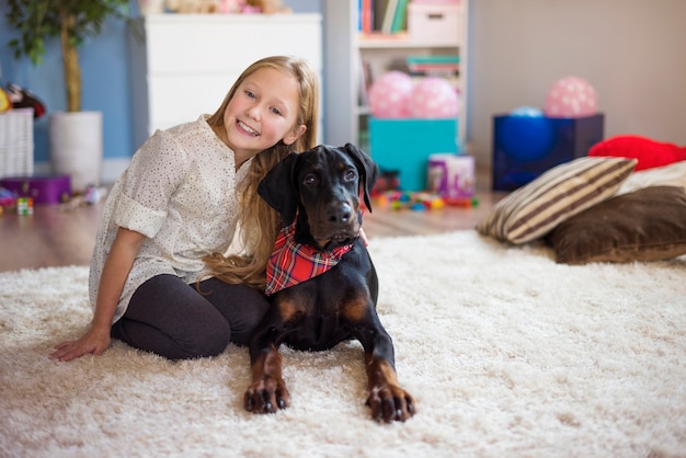 Cute girl posing with her cute pet