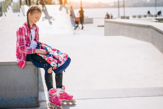 Cute girl roller skating