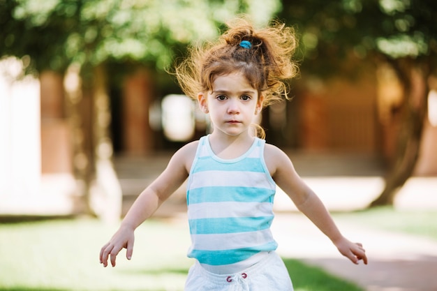 Cute girl walking outdoors