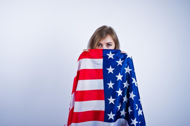 Cute girl with american usa flag isolated on white background