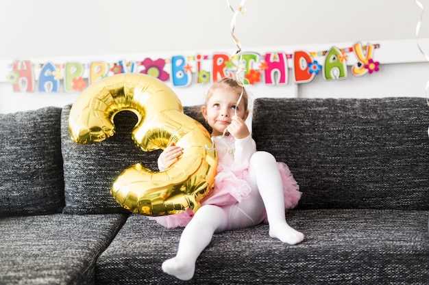 Cute girl with balloon