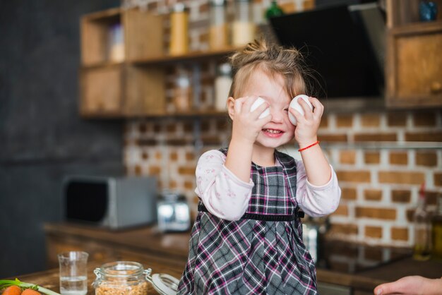 Cute girl with eggs