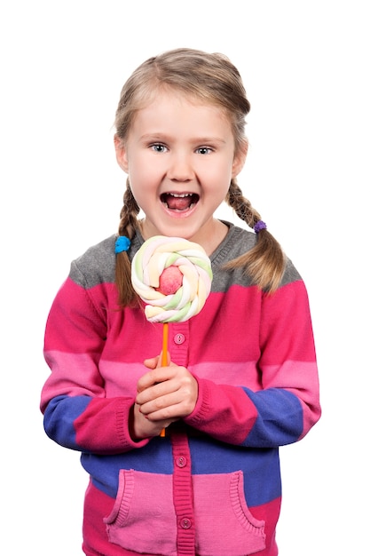 Cute girl with lollipop isolated