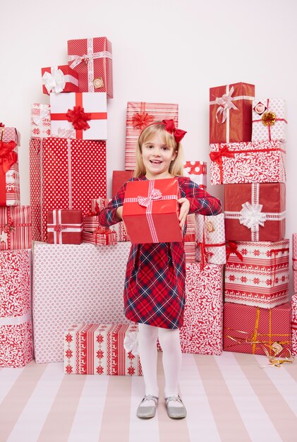 Cute girl with red gift