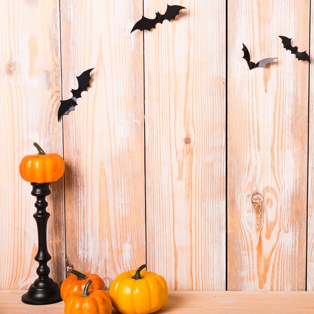 Cute Halloween decorations near wall