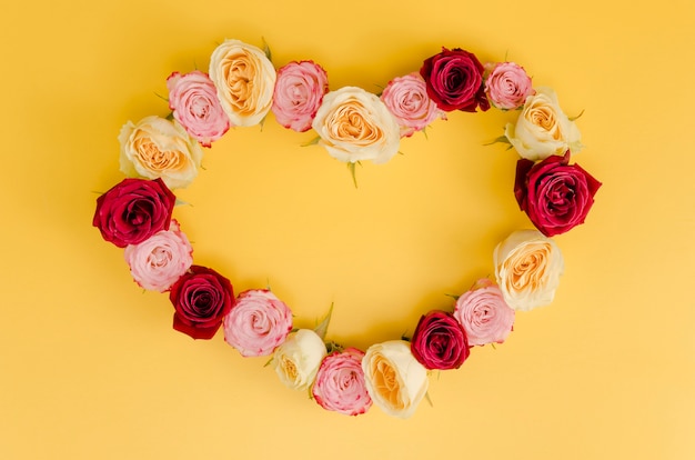 Cute heart rose frame top view