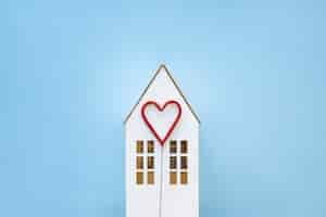 Free photo cute heart on toy house