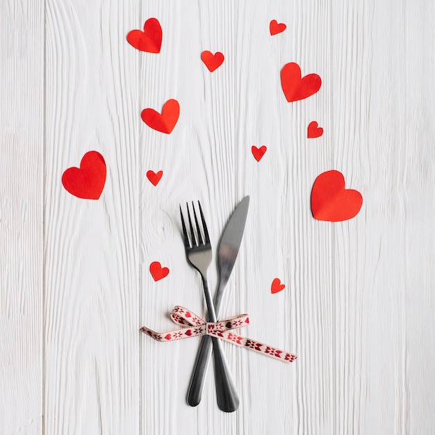 Cute hearts around utensils