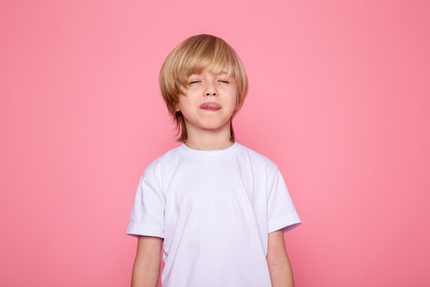 Cute kid child boy cute adorable on pink