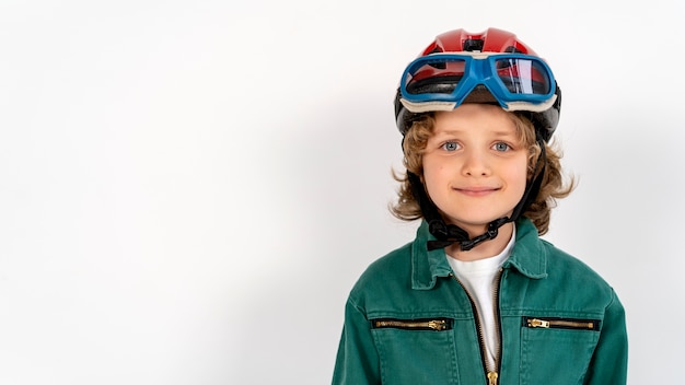 Cute kid playing with flying goggles