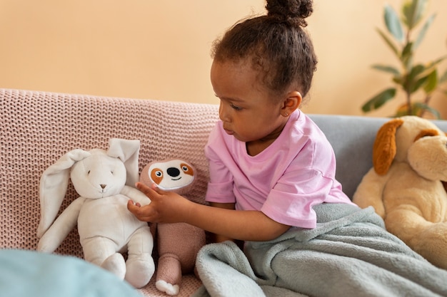 Cute kid with stuffed animal