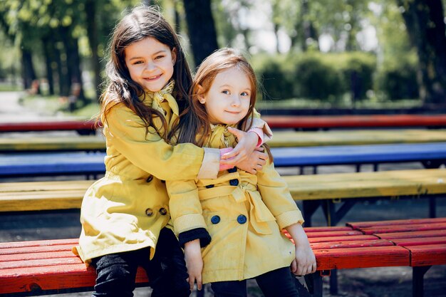 Cute kids plaiyng on a rainy day