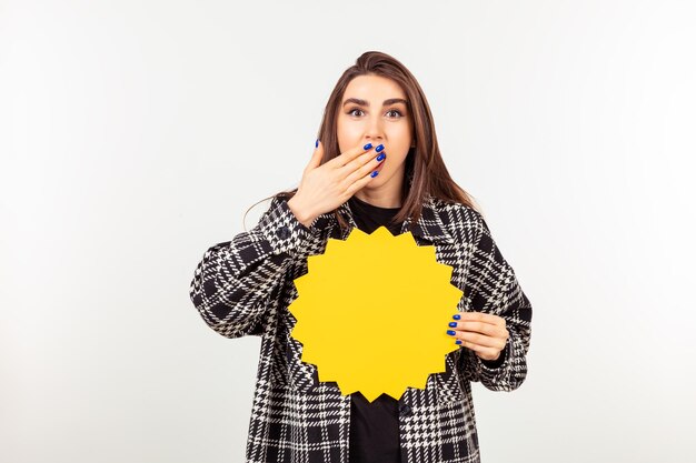 A cute lady holding idea board and put her hand to her mouth