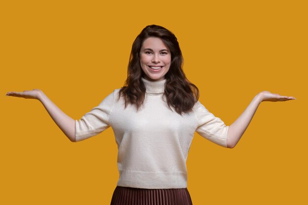 Cute lady with a radiant smile showing the hand gesture