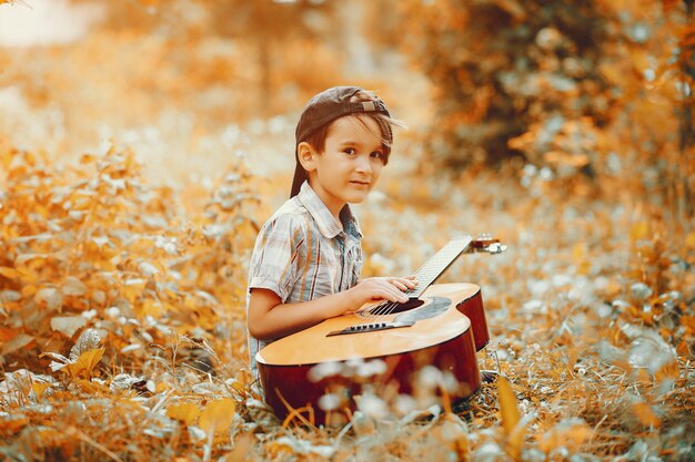 Cute little boy playing in a park