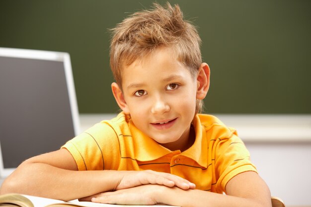 Cute little boy with crossed arms