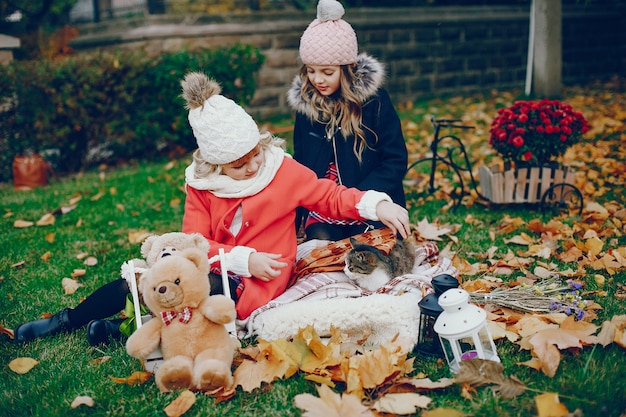 Cute little girl in a autumn park