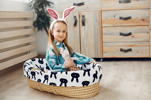 Cute little girl sitting at home 