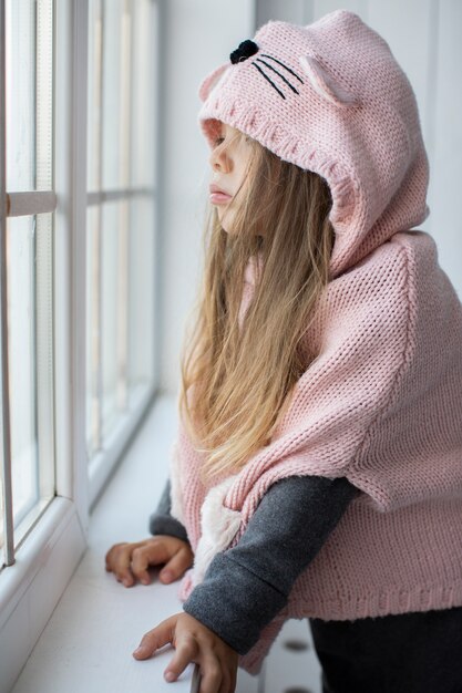 cute little girl with pink pullover