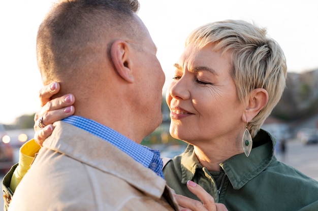 Cute middle age couple being affectionate