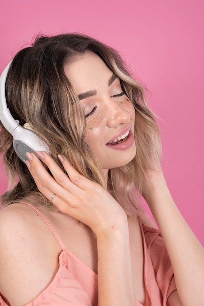 Cute model listening to music