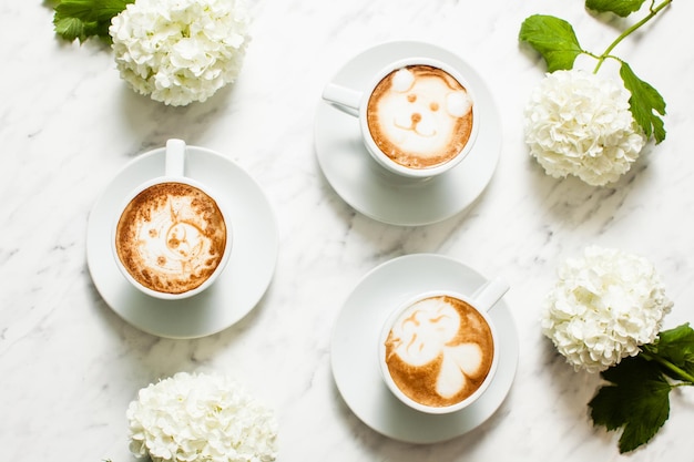 Cute muzzles of aminals from cappuchino foam, latte art coffee