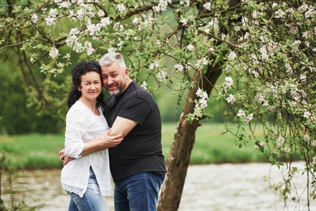 Cute people. Cheerful couple enjoying nice weekend outdoors. Good spring weather