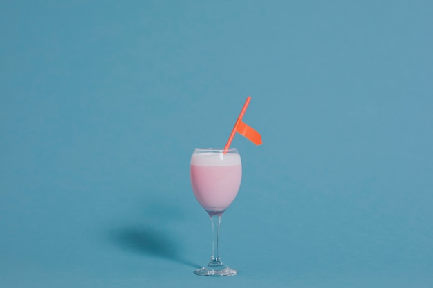 Cute pink fancy drink in a wine glass