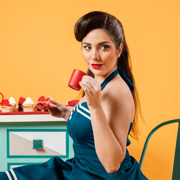 Cute pinup girl in the kitchen