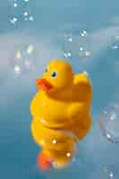 Free photo cute rubber duck still life