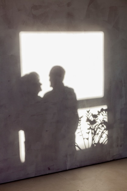 Free photo cute shadow of senior couple in love