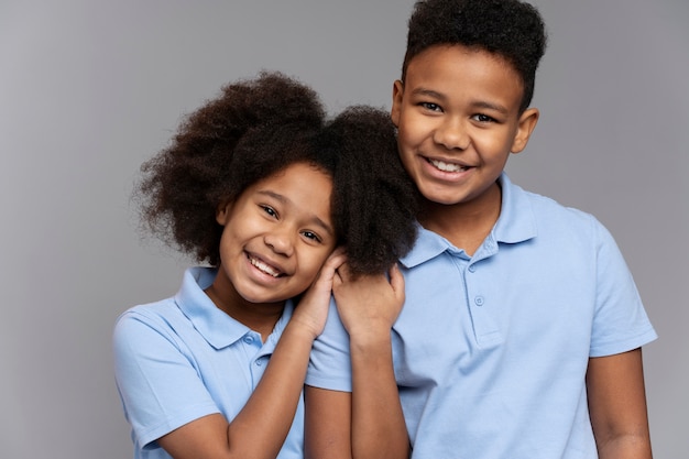 cute siblings posing together