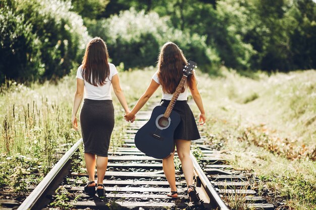 Cute sisters in a park