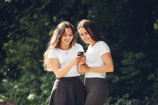 Cute sisters in a park