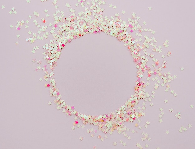 Free photo cute stars confetti round frame