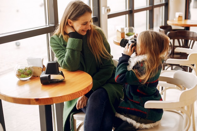 Cute and stylish family in a cafe