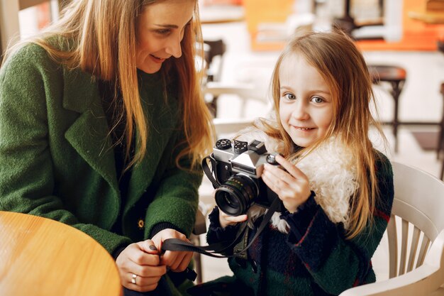 Cute and stylish family in a cafe